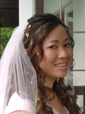 Asian bridal curly hair down style