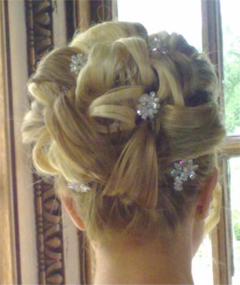 Bridal hair up with barrel curls and two colour clip in hair extensions
