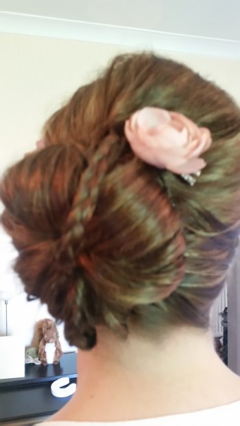 Bridal hairstyle up and plaited