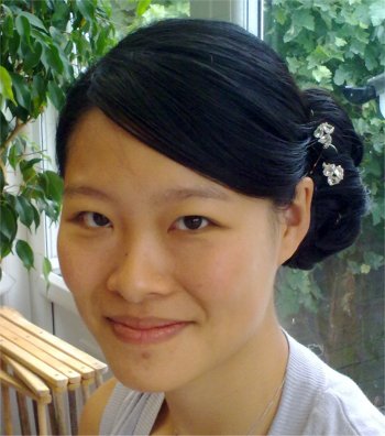 Asian bridesmaid hairstyle with diamante hair pins