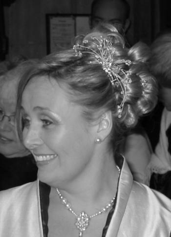 Wedding hair up do with a hairpiece