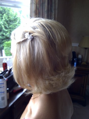 Wedding hairstyle for a short flicked bob