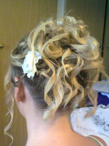Bridesmaid hair up style with lots of curls