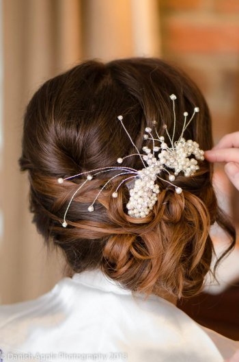 Stunning hair style for brides - hair up, feminine and sexy (Freshwater pearl hair pin www.irresistibleheaddresses.com 01403 871449)