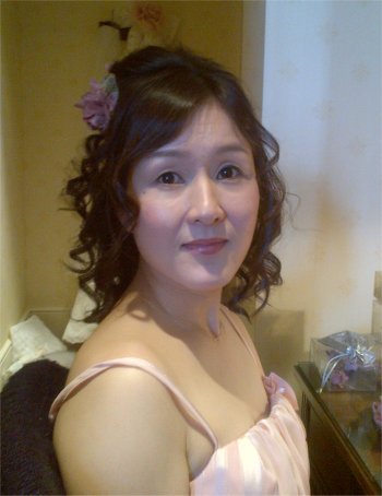 Japanese bridesmaid curly hairstyle and makeup in the Petersham Hotel, Richmond, UK