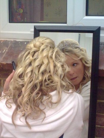 Curly wedding hair style using clip in hair extensions
