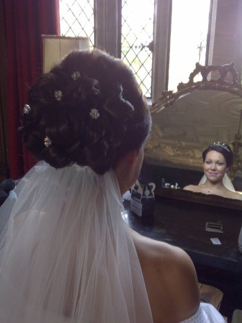 Classic elegant wedding makeup and hair by Your wedding hair and makeup (Crystal Swarovski hair pins and finger tip veil by www.irresistibleheaddresses.com 01403 871325)
