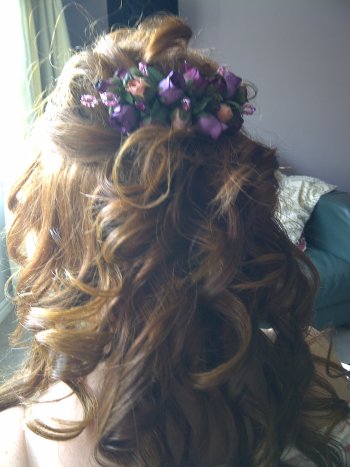 Bridesmaid long hair style for flower hair accessory