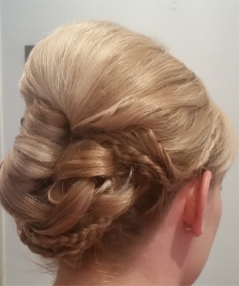 Vintage wedding hairstyle with plaits and rolls www.yourweddinghairandmakeup.co.uk